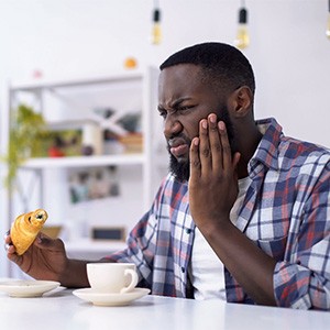 Man with tooth pain.