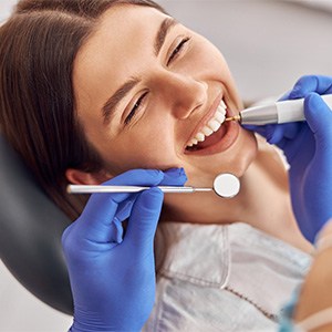 Woman smiling in the dental chair.